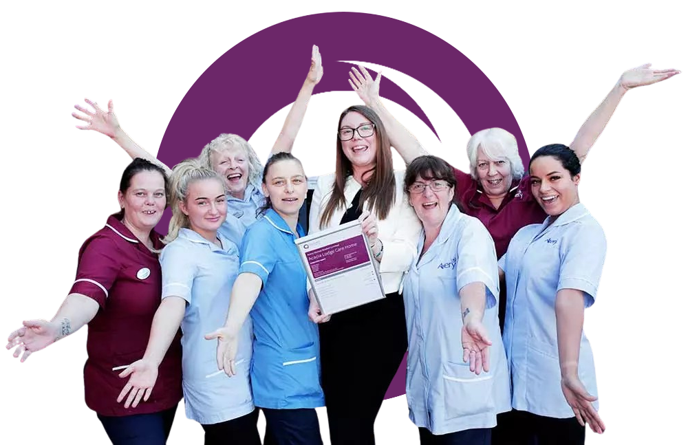 Care staff celebrating a good CQC rating